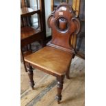 A Regency mahogany pierced back hall chair