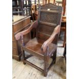 A 17th Century oak hall carver chair