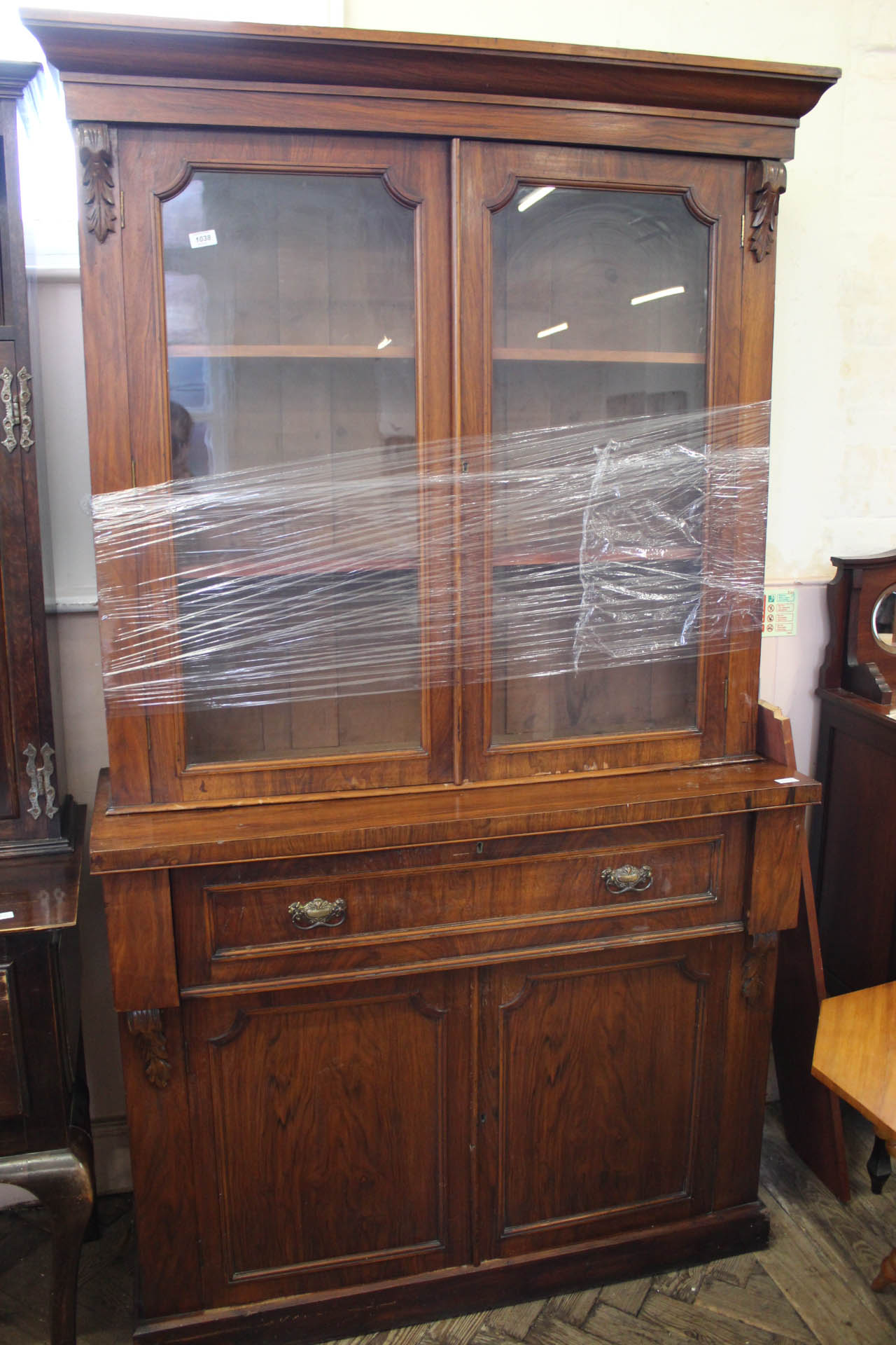An Edwardian walnut secretaire bookcase