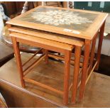 A nest of three 1960's teak tile topped tables marked Mobel Frabrikken Tofton