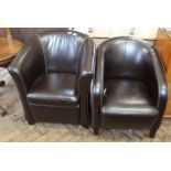 Two similar brown leather tub chairs