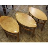 Three 1960's style teak elliptical occasional tables