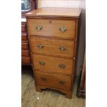 A Georgian style four drawer chest