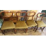 A set of four Victorian elm balloon back dining chairs
