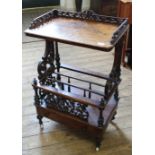 An unusual Victorian inlaid burr walnut Canterbury with single drawer on porcelain castors