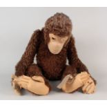 A large wool and felt monkey,