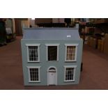 A dolls house and furniture