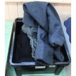 A box of various items of military clothing