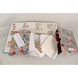 A keep book containing approx 259 plated penny reds plus other stamps including mint packs