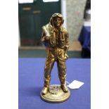 A solid brass figure of an R.A.F.