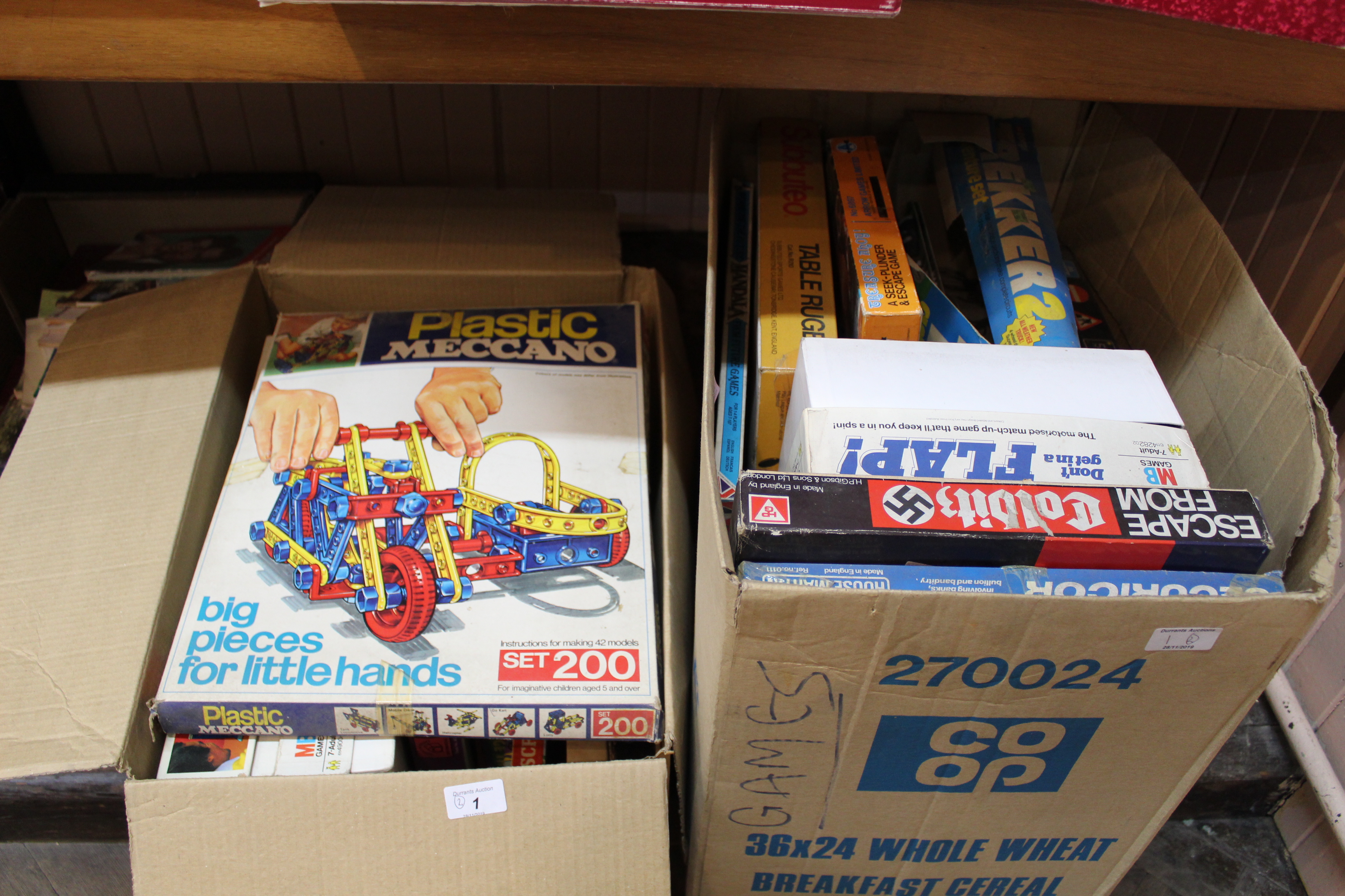 Various board games including plastic Meccano, Beat the Black Ball,