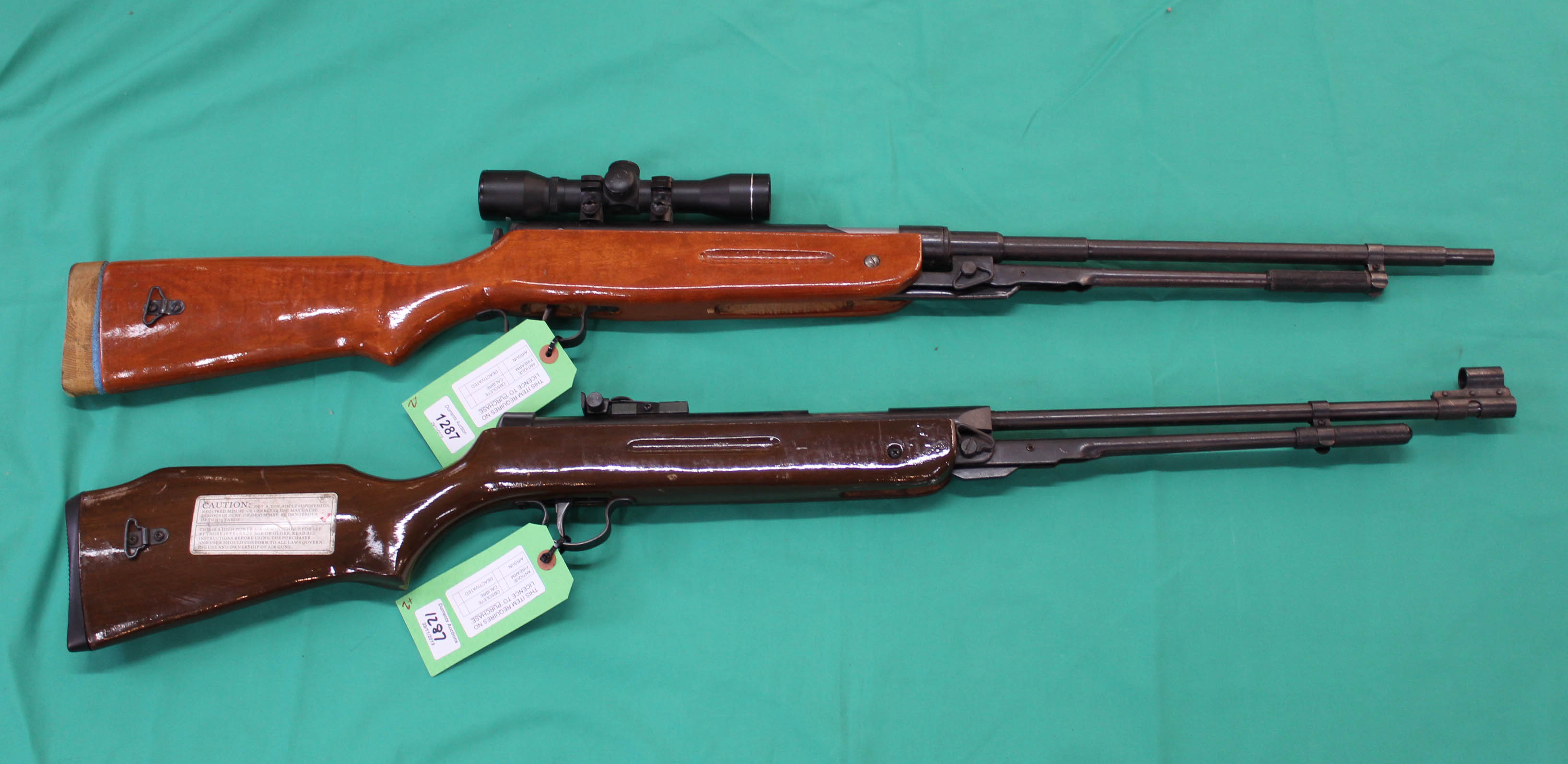 Two Chinese air rifles, one with a scope,