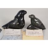 Two inuit carvings of seals by Inoucdjovac 1975