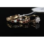 Four 9ct gold rings,