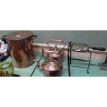 An early 20th Century copper hot water urn with brass tap,