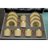 Boxed Mintons orange and gilt coffee set