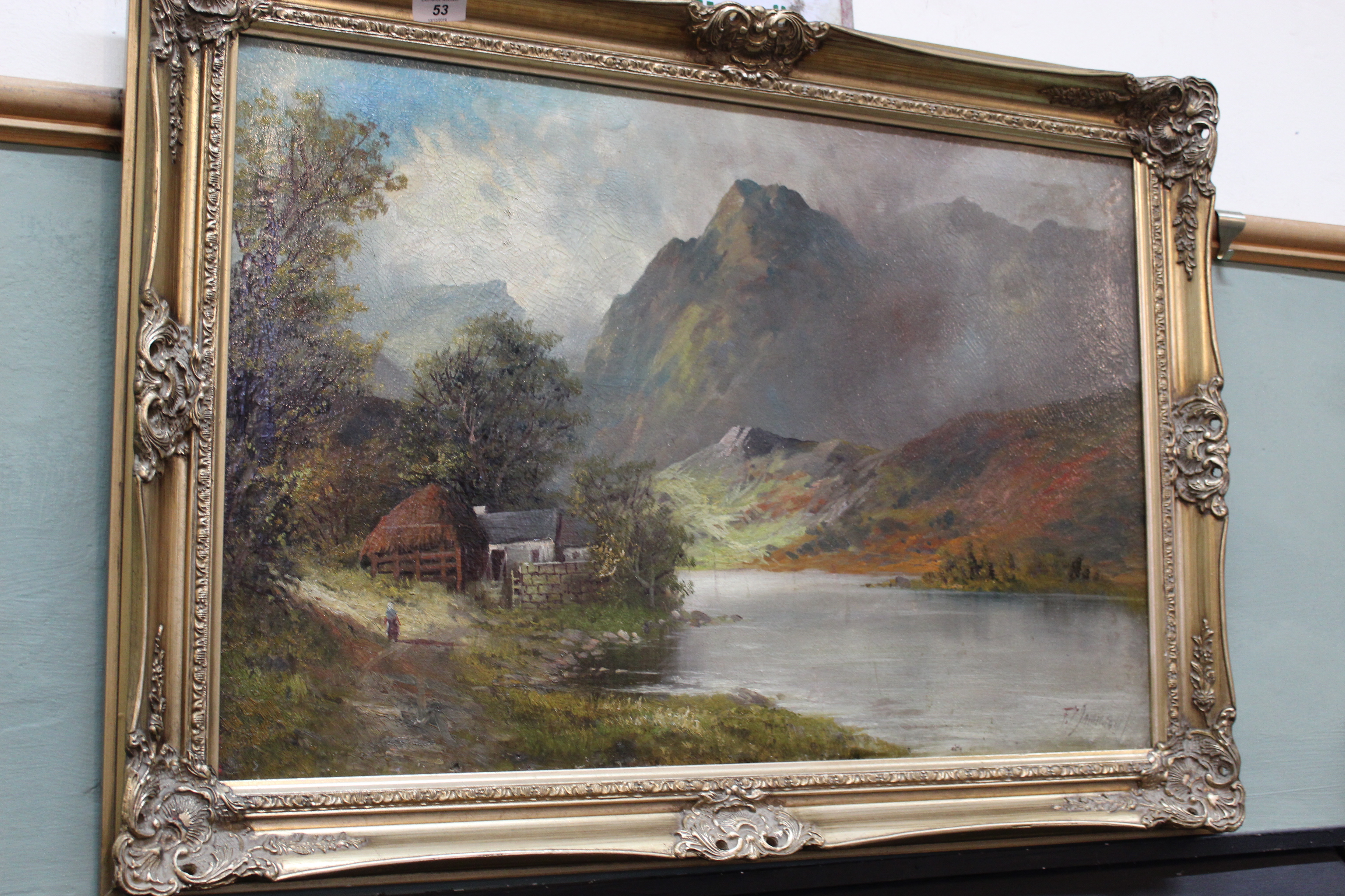 F Jamieson oil on canvas of a river and mountain scene with cottage and figure,