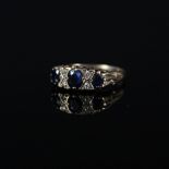 A 9ct gold sapphire and diamond ring,