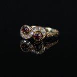 An 18ct garnet and old cut diamond ring, Chester hallmarked,