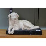 A pottery golden retriever on plinth by Irvine Fieldings