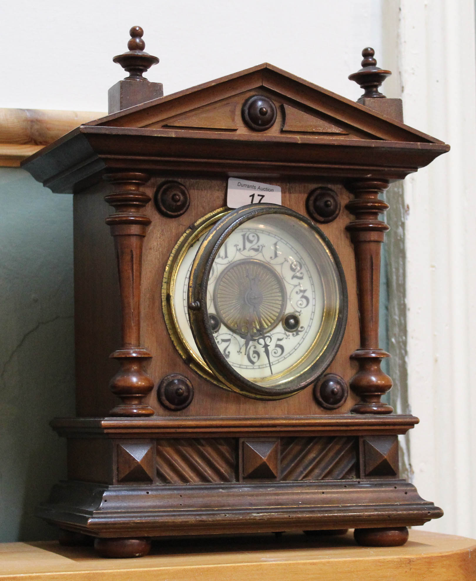 A mahogany striking mantel clock