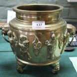 A heavy Chinese brass two ringed pot with relief figure decoration, mark to base,