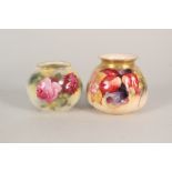 Two Royal Worcester floral and fruit decorated vases,