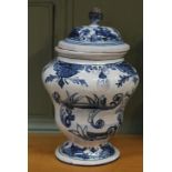 A Majolica blue floral lidded jar,