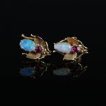 A pair of yellow metal earrings in the form of flies set with rubies and opals