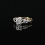 An 18ct platinum set Art Deco style diamond ring,