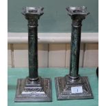 A pair of silver plated candlesticks with presentation inscription to Astley Weaver plus various