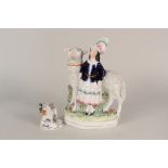 A Victorian Staffordshire girl and sheep group plus a 19th Century porcelain Samson poodle and