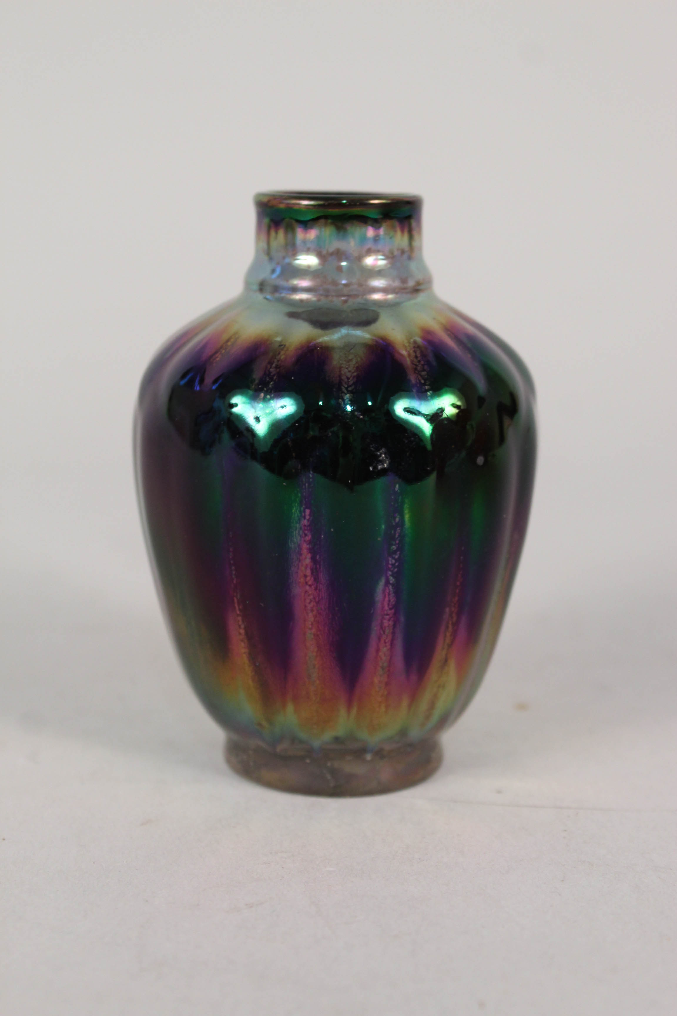 An early 20th Century high glazed mauve lustre vase, trace mark to base,