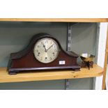 A mahogany striking mantel clock plus a small brass bowl