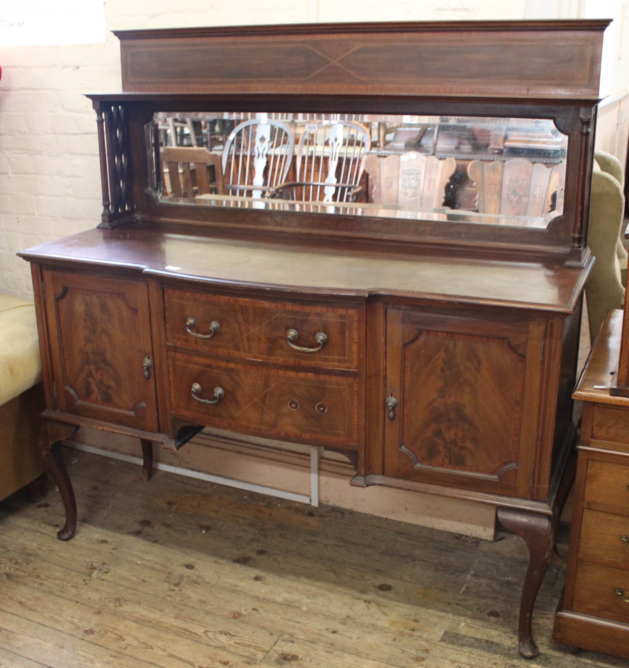 An Edwardian inlaid mahogany mirrored sideboard with two drawers and two doors