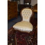 Victorian Mahogany Framed Nursing Chair with Golden Buttoned Upholstery