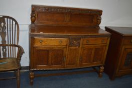 Oak Sideboard with Carving and Paneled Doors