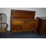 Oak Sideboard with Carving and Paneled Doors