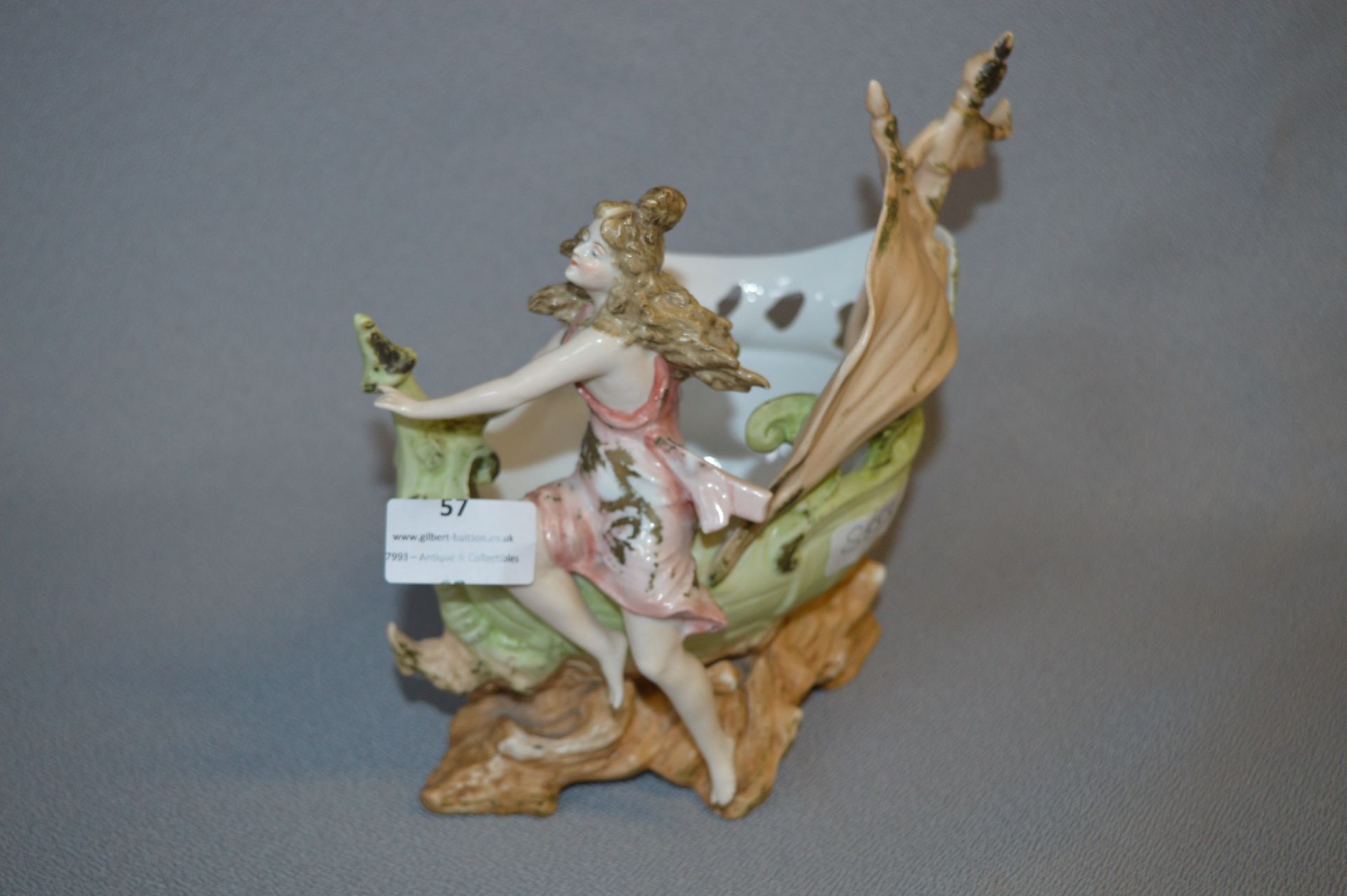 Continental Porcelain Figurine - Girl on Shell Sailing Boat