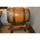 Metal Bound Oak Barrel with Tap on Pine Stand