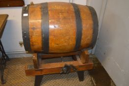 Metal Bound Oak Barrel with Tap on Pine Stand