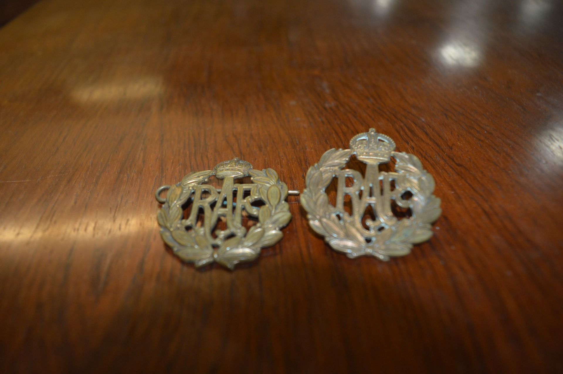 Two RAF Cap Badges