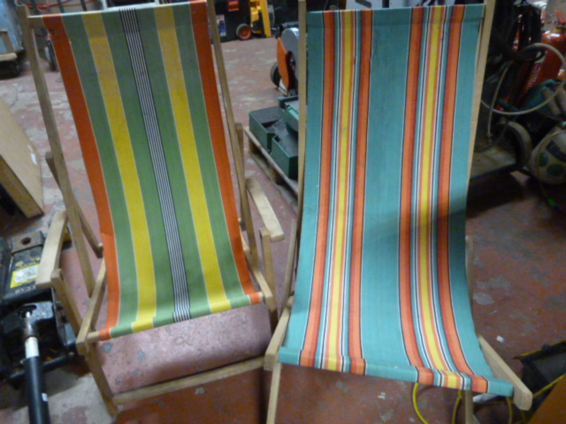 Two Canvas Covered Deck Chairs