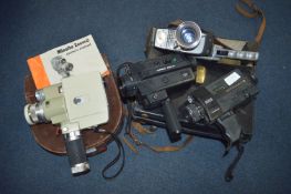 Four Vintage Movie Cameras Including Minolta Zoom
