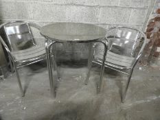 *Circular Polished Aluminium Table with Two Stacka