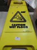 *Two "Caution Wet Floor" Signs