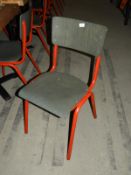 Twelve Red Tubular Framed Dining Chairs with Grey Plywood Seats & Back