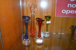 Four Coloured Glass Vases
