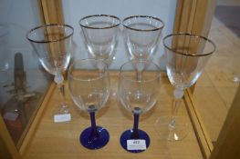 Set of Four Gilt Rimmed and a Pair of Blue Based W