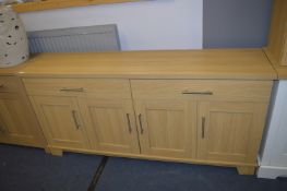 *Four Door Sideboard in Light Oak Finish with Brus